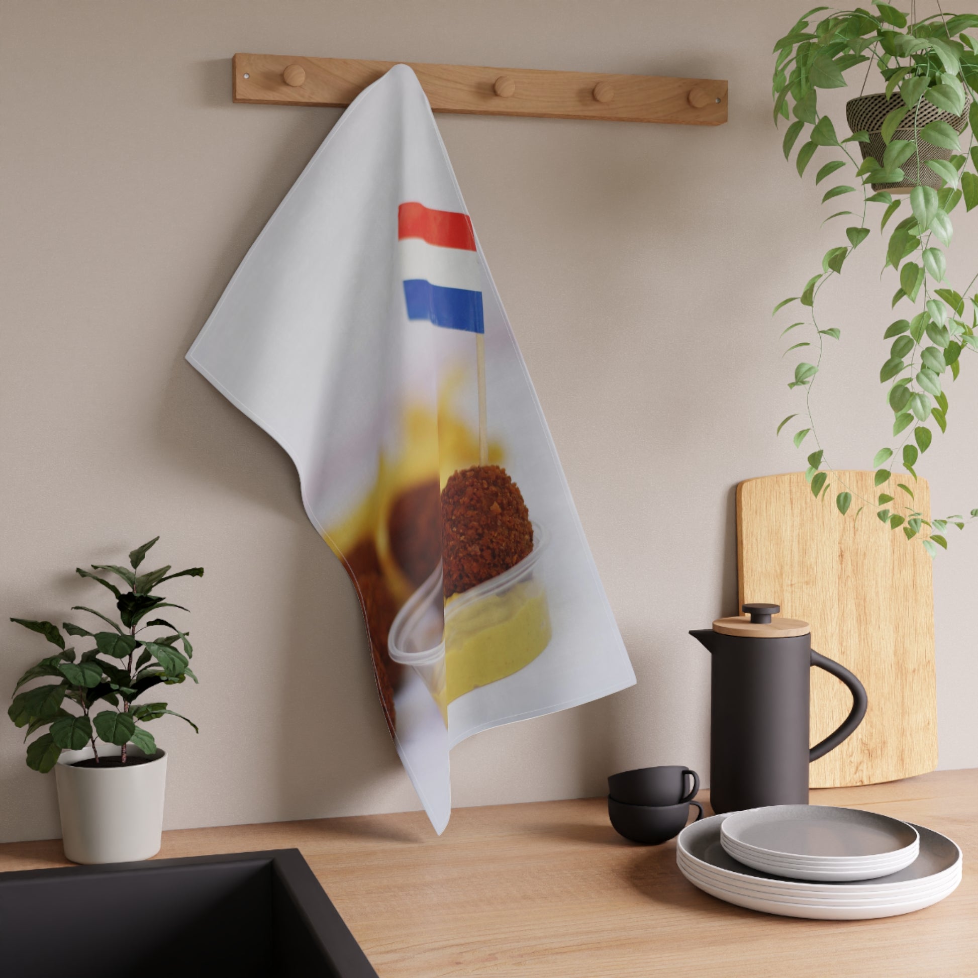 Nederlandse vlag in bitterbal theedoek hangend